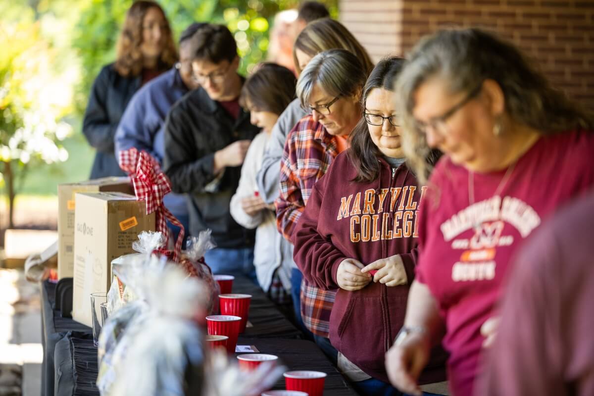 Photo of people in a line for food