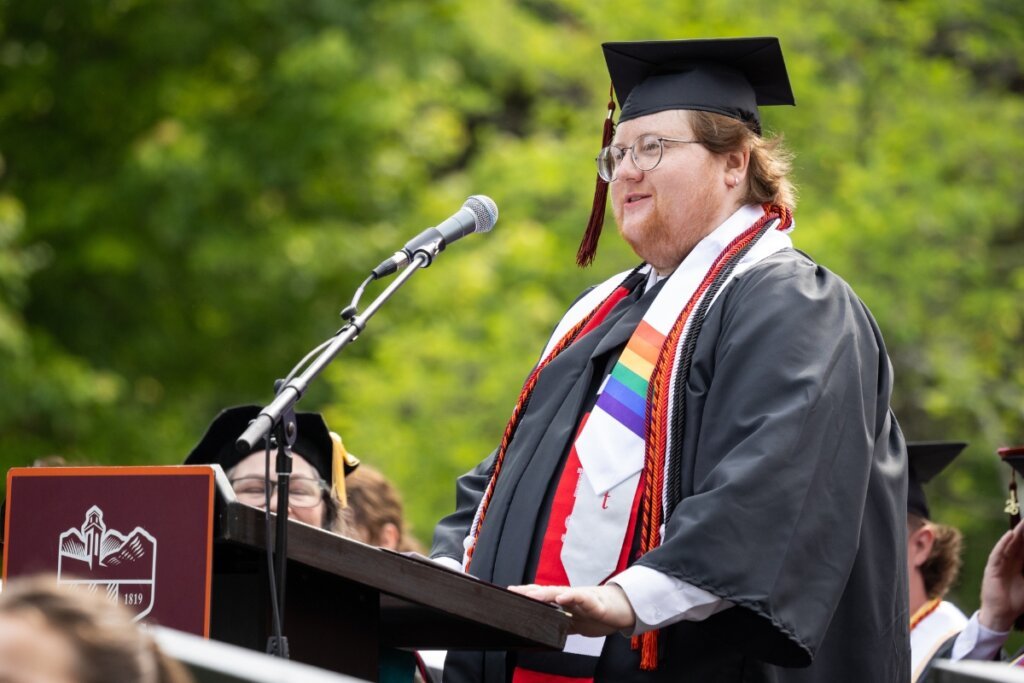 Photo of outgoing Maryville College SGA President Austin McKee addressing the Class of 2026